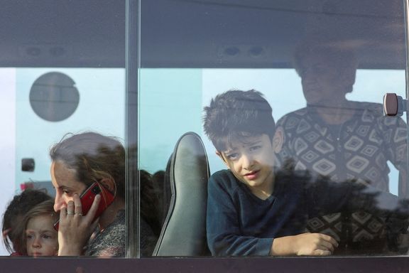 Refugees from Nagorno-Karabakh region are seen in a bus upon their arrival at a checkpoint in the village of Kornidzor, Armenia, September 24, 2023.