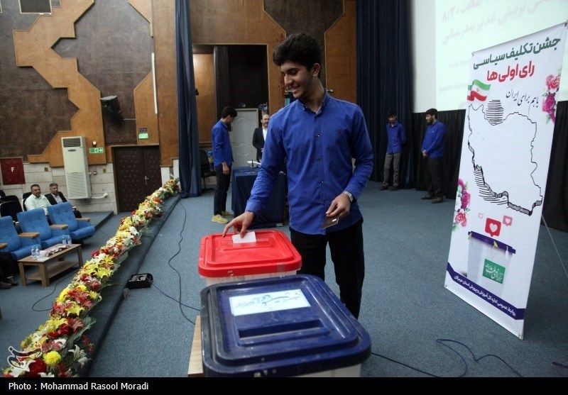 Iranian students voting in a mock election to encourage participation in the parliamentary election, Bandar Abbas, southern Iran, February 2024  