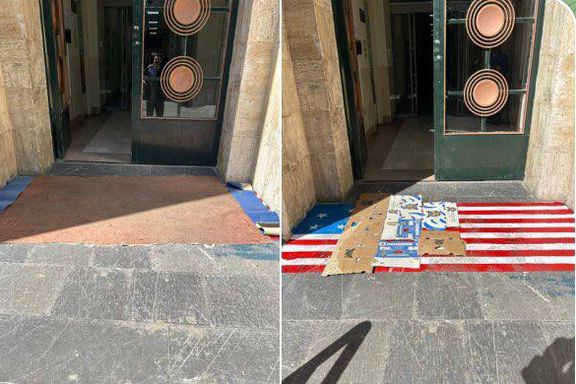 مسئولان دانشگاه تهران پرچم آمریکا را که برای لگدمال شدن روی زمین کشیده بودند، پوشاندند