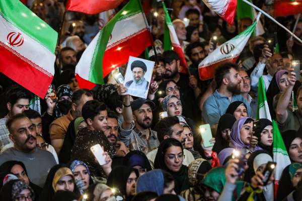 Iran’s nightly pro-state rallies become factional battleground