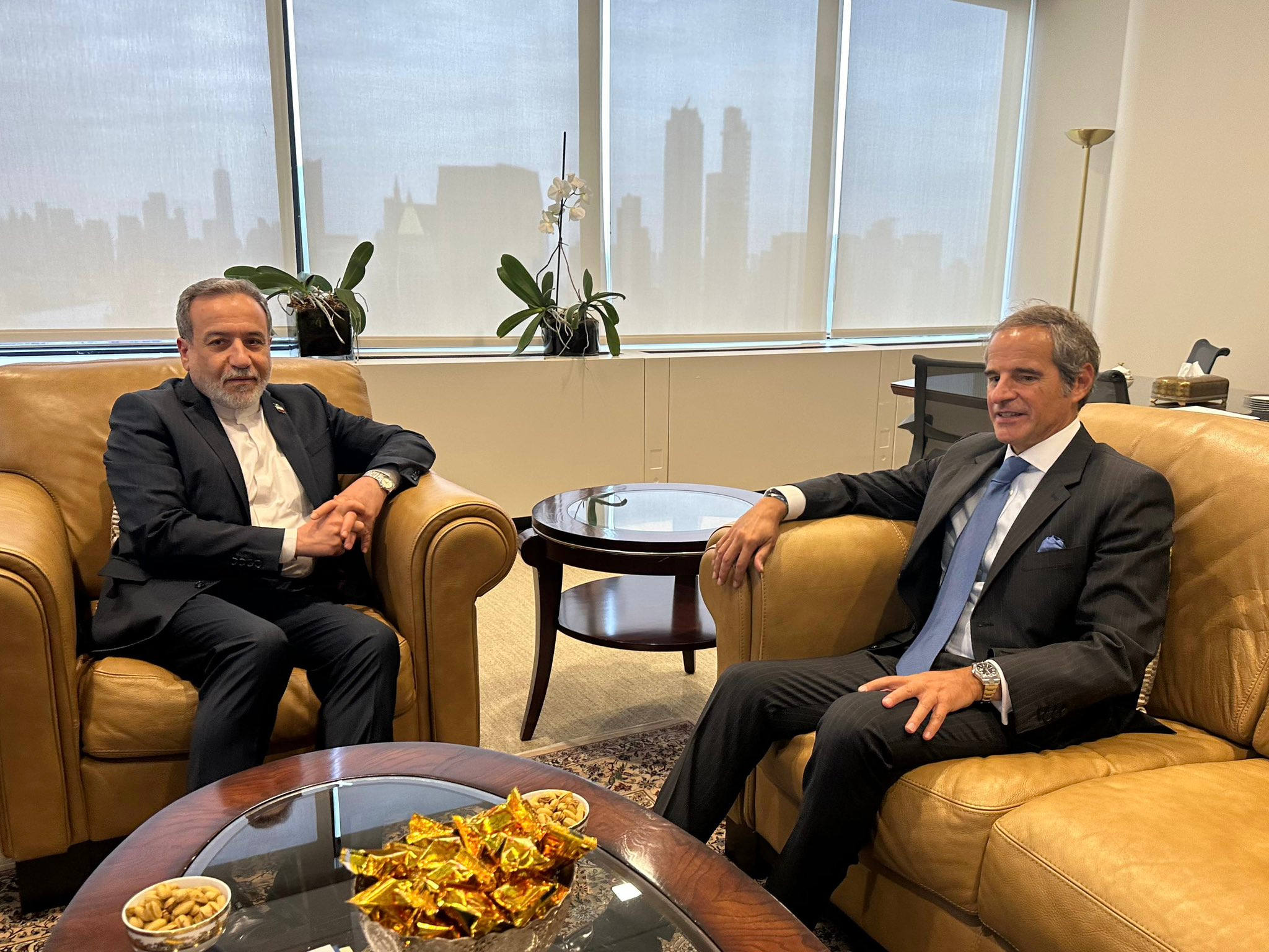 Iran warns against sanctions 'confrontation' as IAEA cites difficult talks