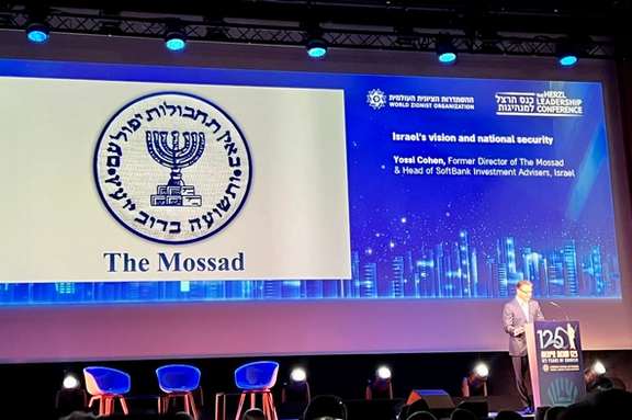 Former Mossad director Yossi Cohen speaking during an event in Switzerland’s Basel on August 29, 2022