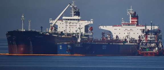 The Liberian-flagged oil tanker Ice Energy transfers crude oil from the Iranian-flagged oil tanker Lana (former Pegas), off the shore of Karystos, on the Island of Evia, Greece, May 26, 2022.