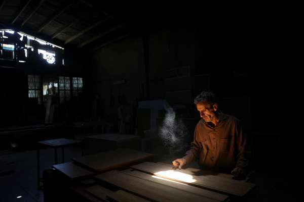‘They’ve turned the clock back centuries’: Iran power cuts mar daily life