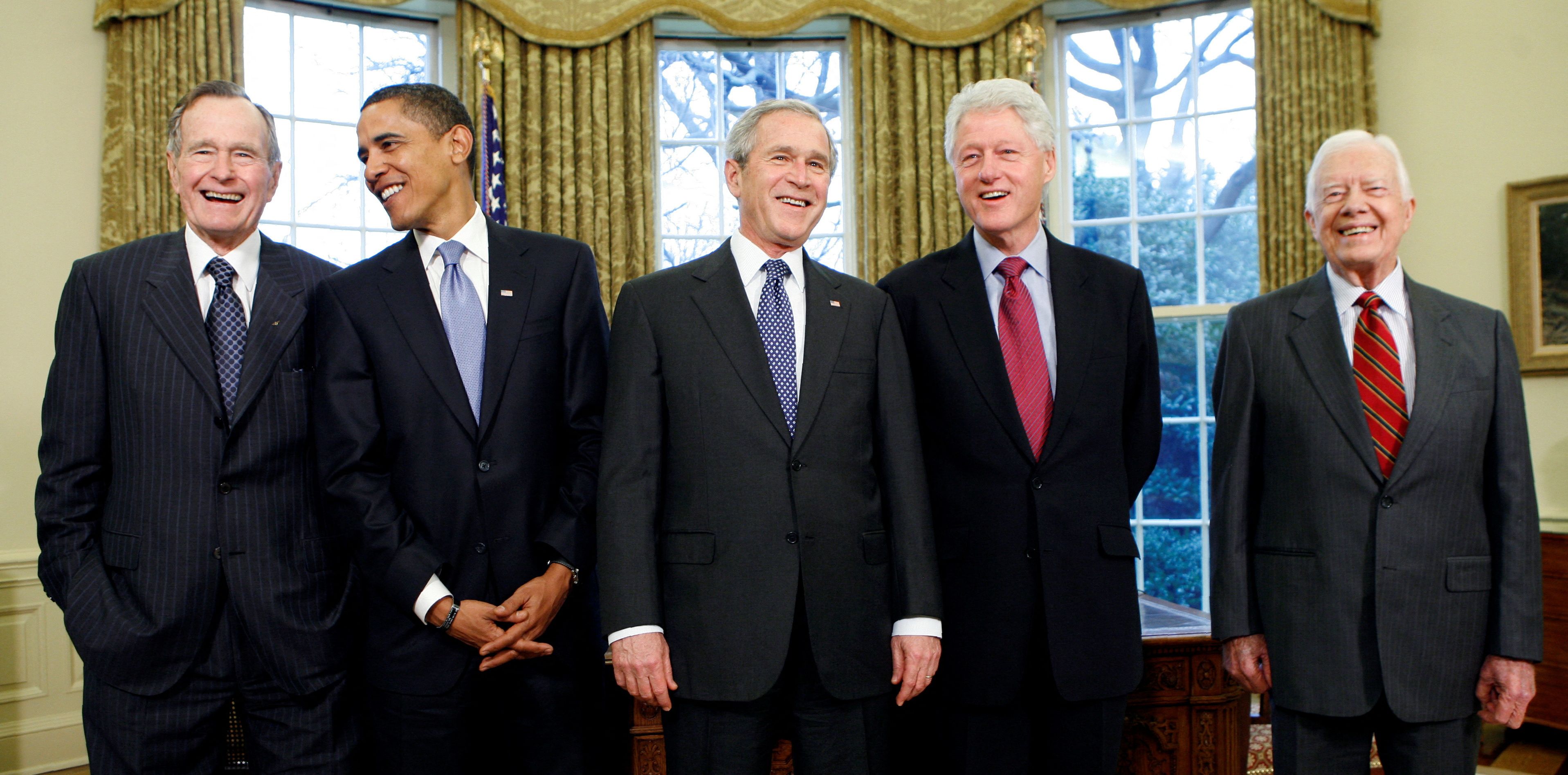 Former President George H.W. Bush, President-elect Barack Obama, President George W. Bush, former President Bill Clinton and former President Jimmy Carter meet in the Oval Office of the White House in Washington, U.S. January 7, 2009.