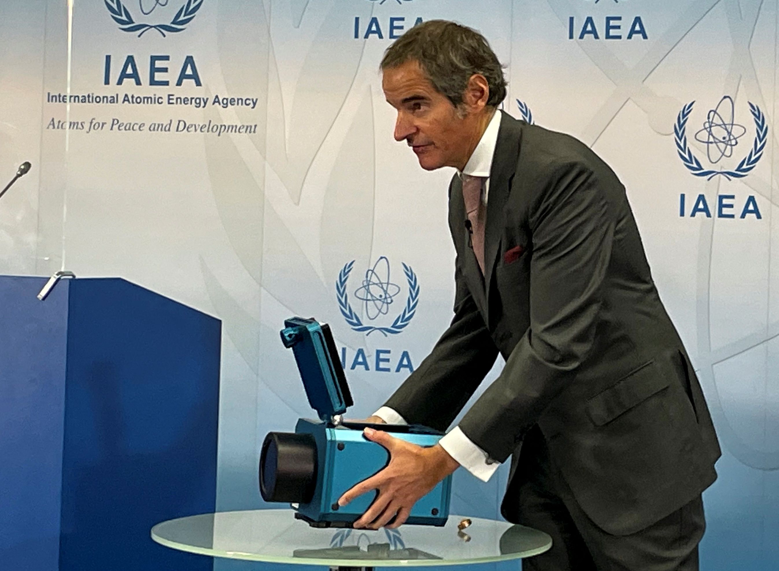 IAEA Director General Rafael Grossi presents a surveillance camera in Vienna, Austria, on Friday, December 17, 2021