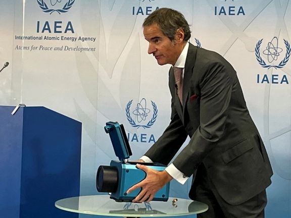 IAEA Director General Rafael Grossi presents a surveillance camera in Vienna, Austria, on Friday, December 17.