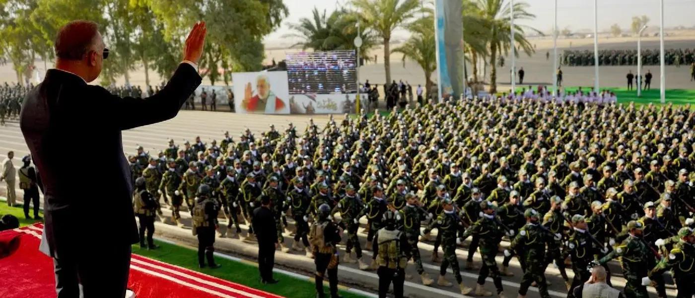 Iraqi Prime Minister Mustafa al-Kadhimi during a military parade by Iran-backed Shiite militia Hashd al-Shaabi, in the town of al-Khalis, Diyala province, eastern Iraq, on July 23, 2022