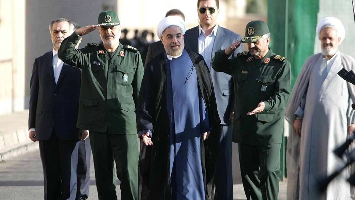 Former Iranian president Hassan Rouhani (center) and IRGC commander-in-chief Hossein Salami (left) and former IRGC chief Mohammad Ali Jafari  