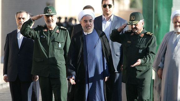 Former Iranian president Hassan Rouhani (center) and IRGC commander-in-chief Hossein Salami (left) and former IRGC chief Mohammad Ali Jafari