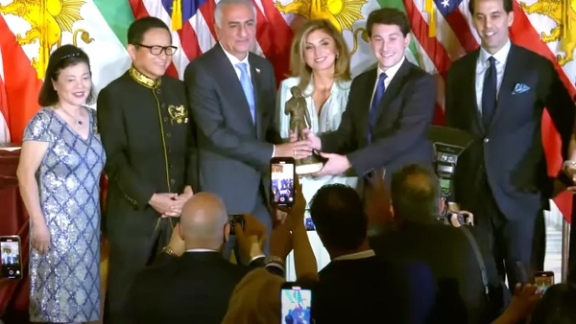 Prince Reza Pahlavi, accompanied by his wife Yasmine Pahlavi, receives the Nixon Foundation’s Architect of Peace Award during a ceremony in California on October 22, 2024.