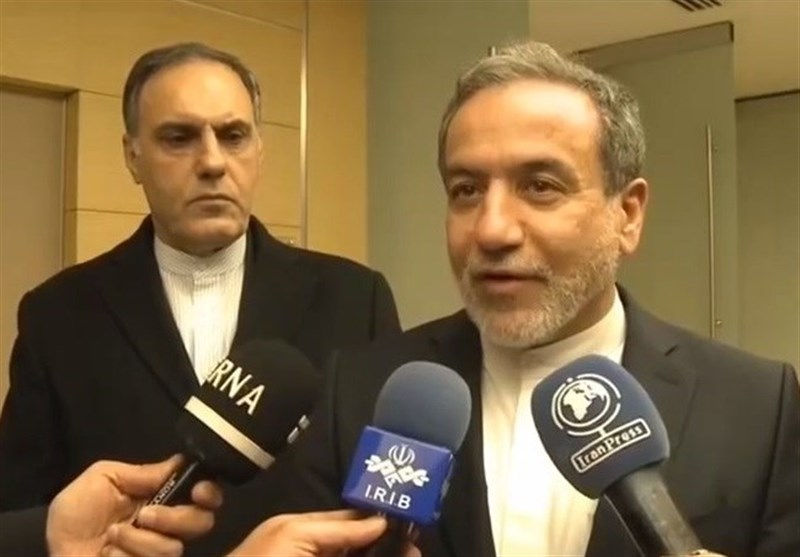 Iran's Foreign Minister Abbas Araghchi (right) upon arrival in Turkey on December 2, 2024. 