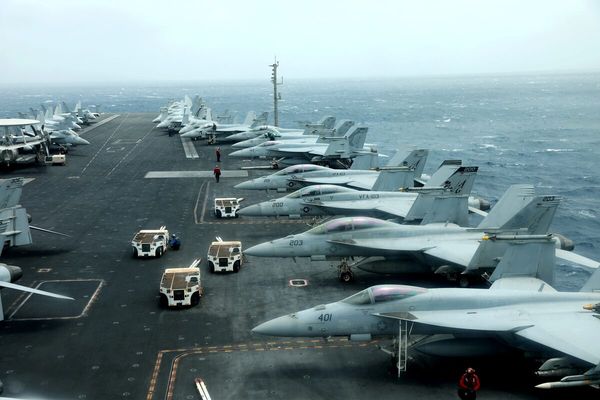 Iranian official rhetoric girds for war as US fleet nears