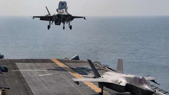A US Navy plane landing on an aircraft carrier. FILE PPHOTO