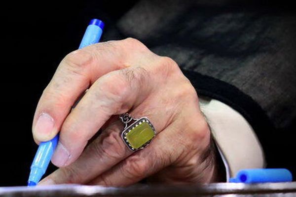 Iran Daily Banned Over Graphic Of Khamenei's Hand Drawing Poverty Line