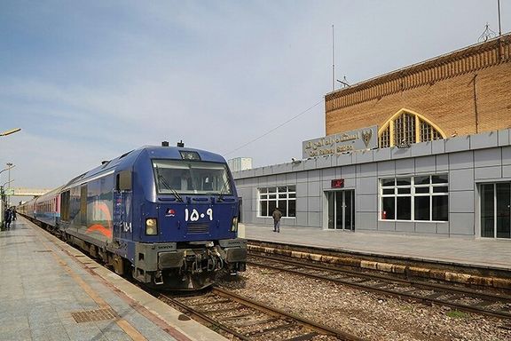 A passenger train in Qom railway station. Undated