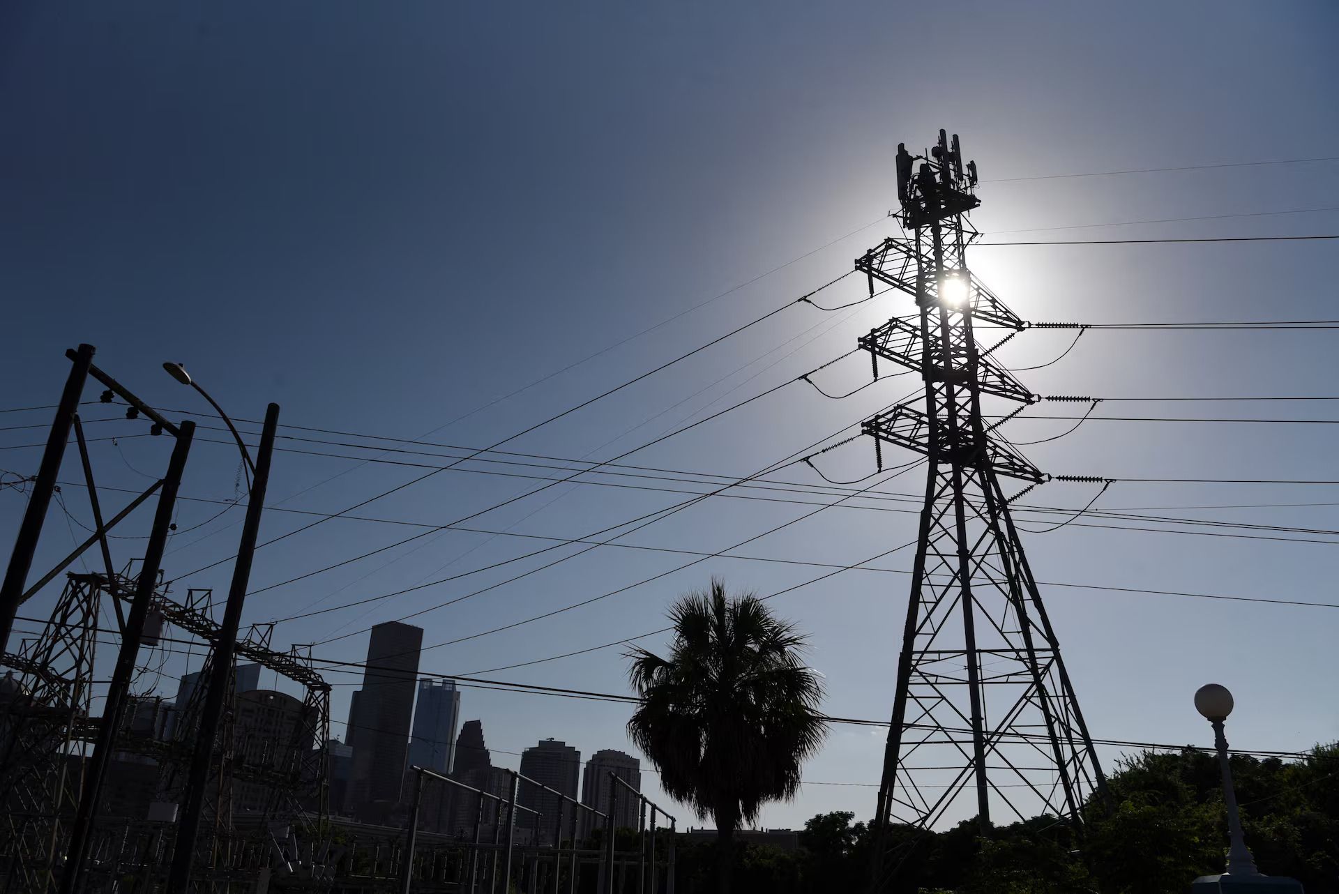 Power lines are seen in Houston, Texas, on June 27, 2023.
