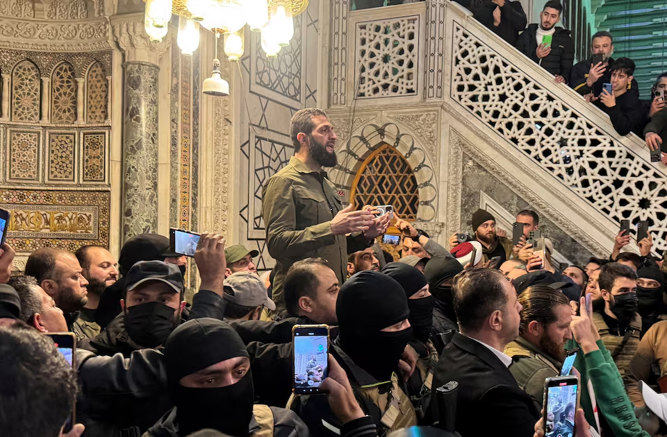 Top rebel commander Muhammad al-Julani speaks to a crowd at Ummayad Mosque in Damascus, after Syrian rebels announced that they have ousted President Bashar al-Assad, Syria December 8, 2024. 