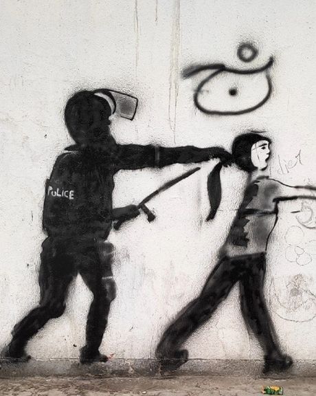 A graffiti against the crackdown on women who defy mandatory hijab (file photo)