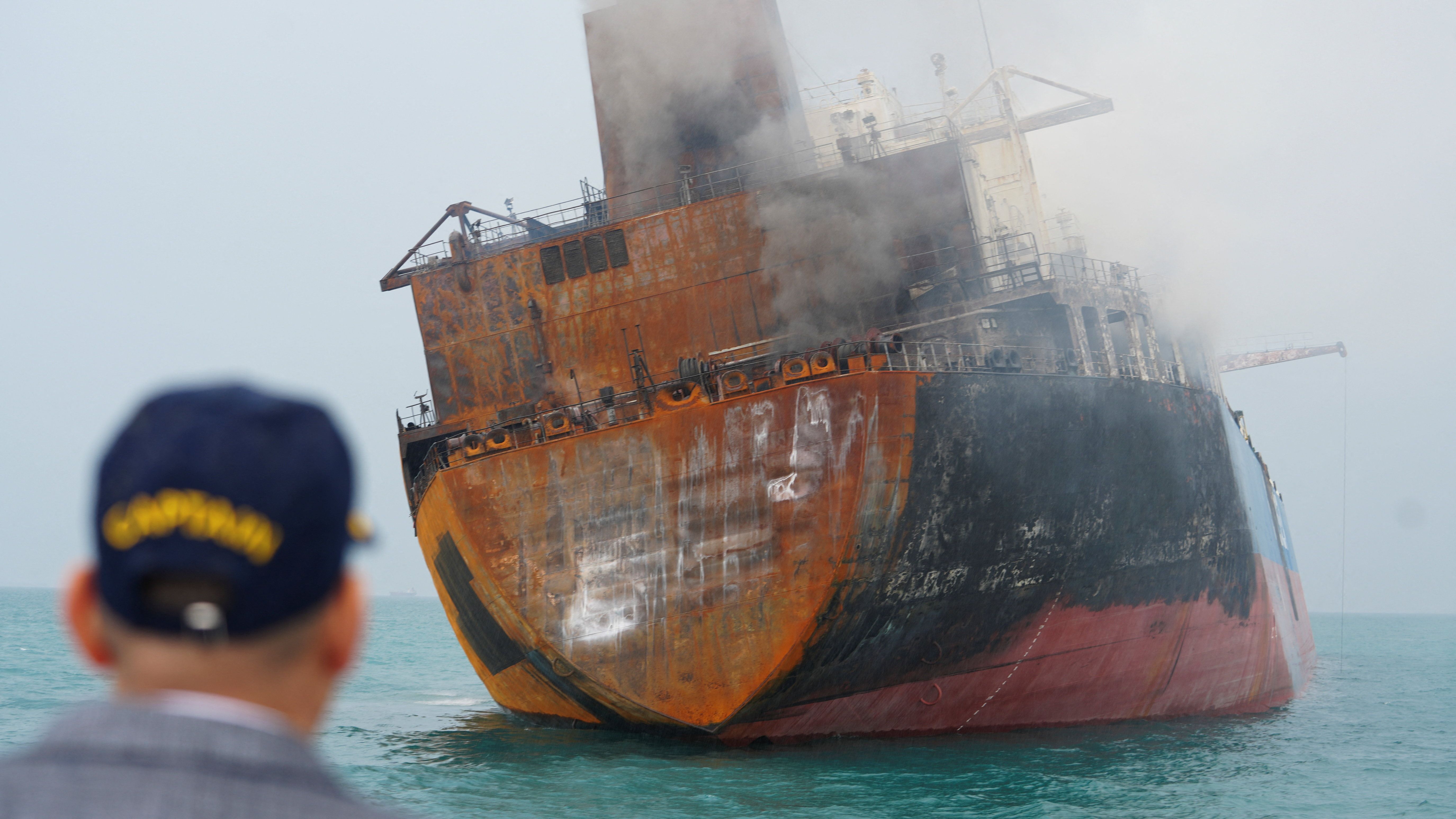 A foreign tanker carrying Iraqi fuel oil damaged after catching fire in Iraq's territorial waters, following unidentified attacks that targeted two foreign tankers, according to Iraqi port officials, near Basra, Iraq, March 12, 2026. 