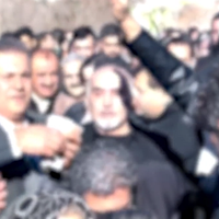 Iranians burying slain protest youths mourn with dancing and defiance