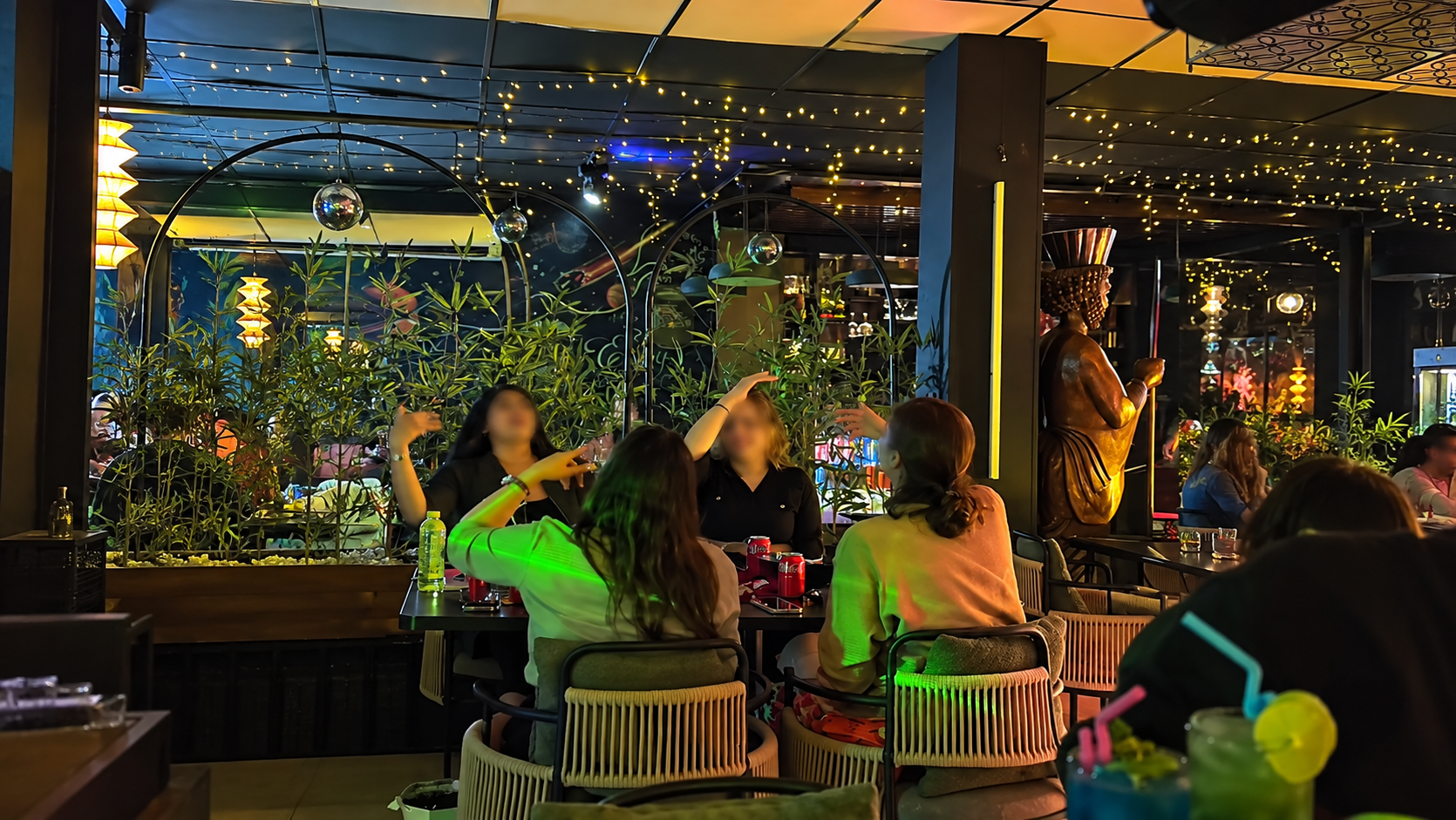 Women gather at a café in Iran.