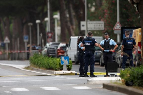 French police stand guard after cars were set on fire in front of the city's synagogue, in La Grande-Motte, France, August 24, 2024.