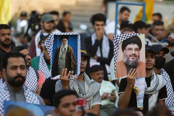 US Strikes On Iranian Militia In Iraq Elicit Warning From PM