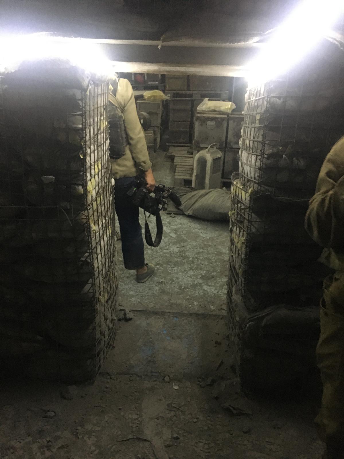 Foreign journalists tour an underground tunnel in Majdal Zoun, southern Lebanon, during an Israeli military media embed.