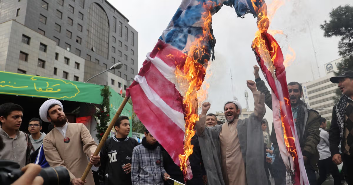 Iran denies ban on 'death to America' chants, flag burning at rallies