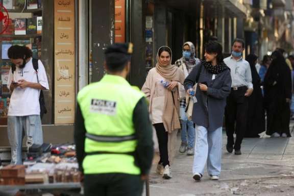 Iranian women walk on a street during the revival of morality police in Tehran, Iran, July 16, 2023.