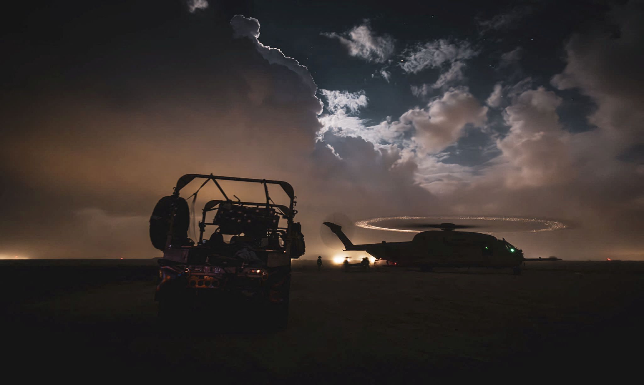 The silhouette of a helicopter, which the Israel Defense Forces say was used to evacuate the injured soldiers, in a location given as Gaza, amid the ongoing conflict between Israel and the Palestinian Islamist group Hamas, in this handout image released on January 31, 2024. 