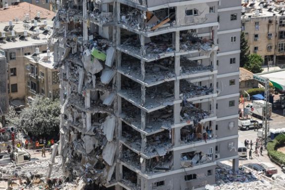 A building stands damaged following a missile attack from Iran, in Bat Yam, Israel, June 15, 2025.