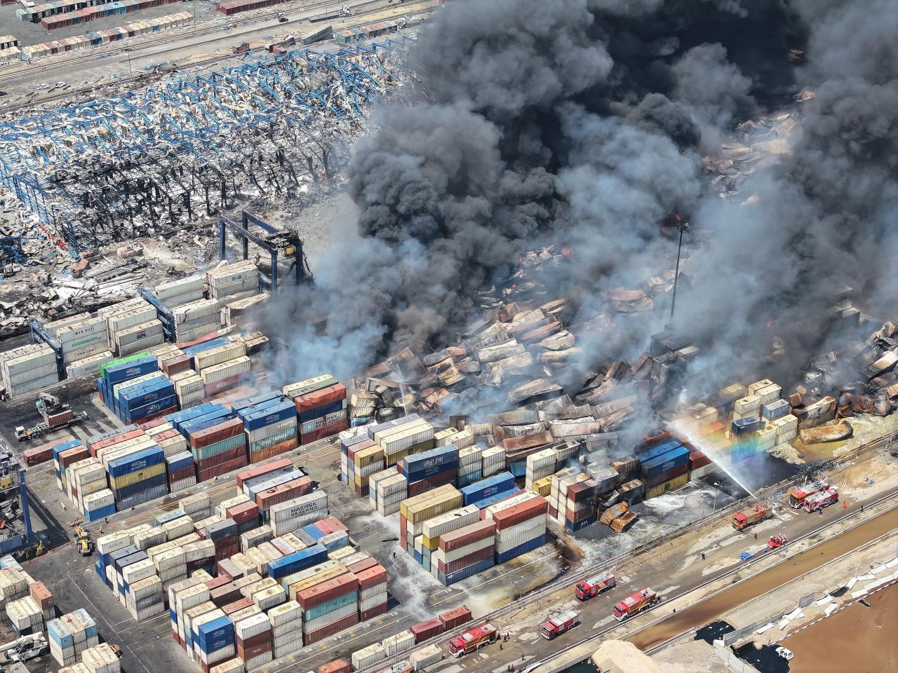 Port shutdown halts over half of Iran's cargo as fire not yet contained