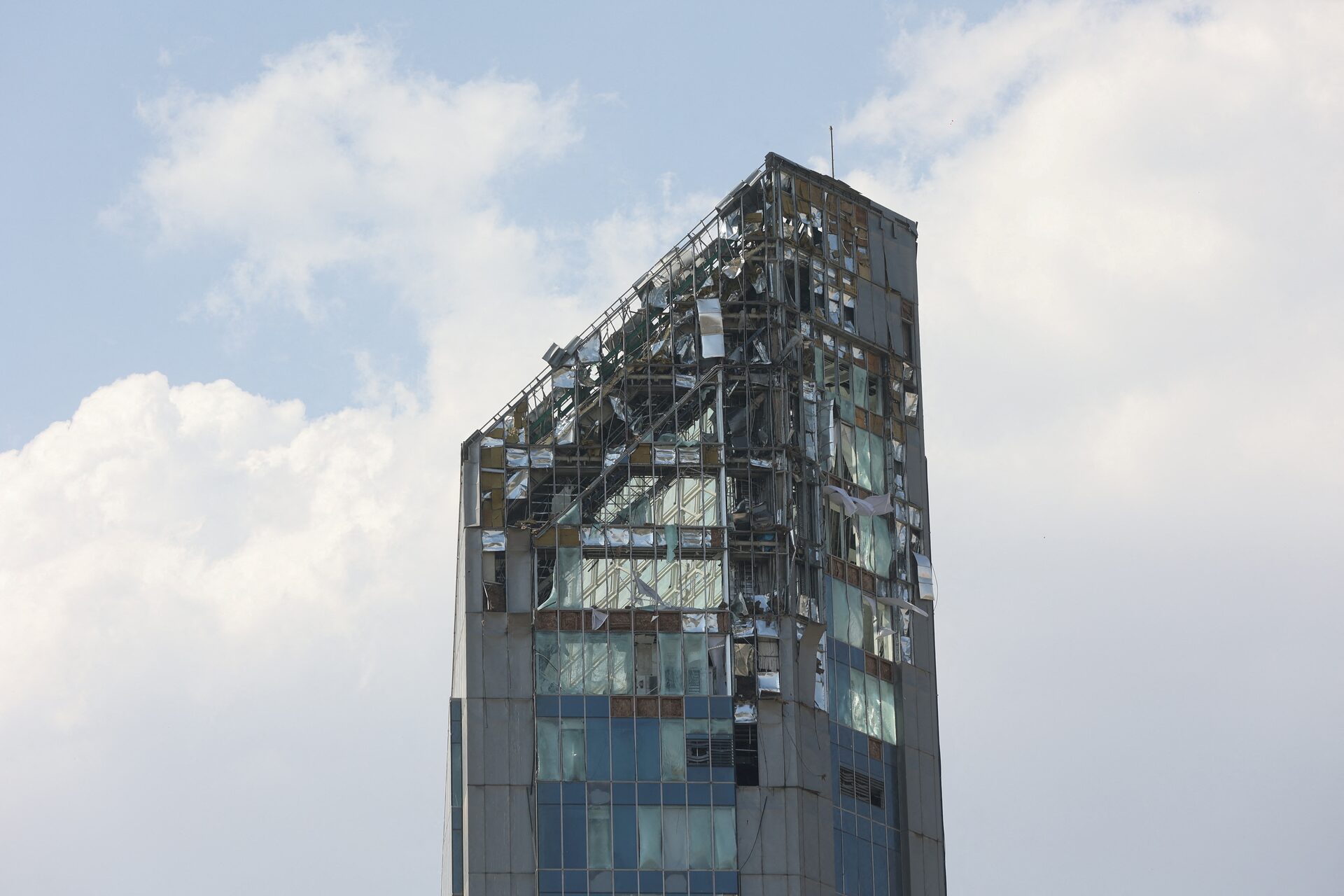 A building stands damaged in the aftermath of Israeli strikes, in Tehran, Iran, June 13, 2025