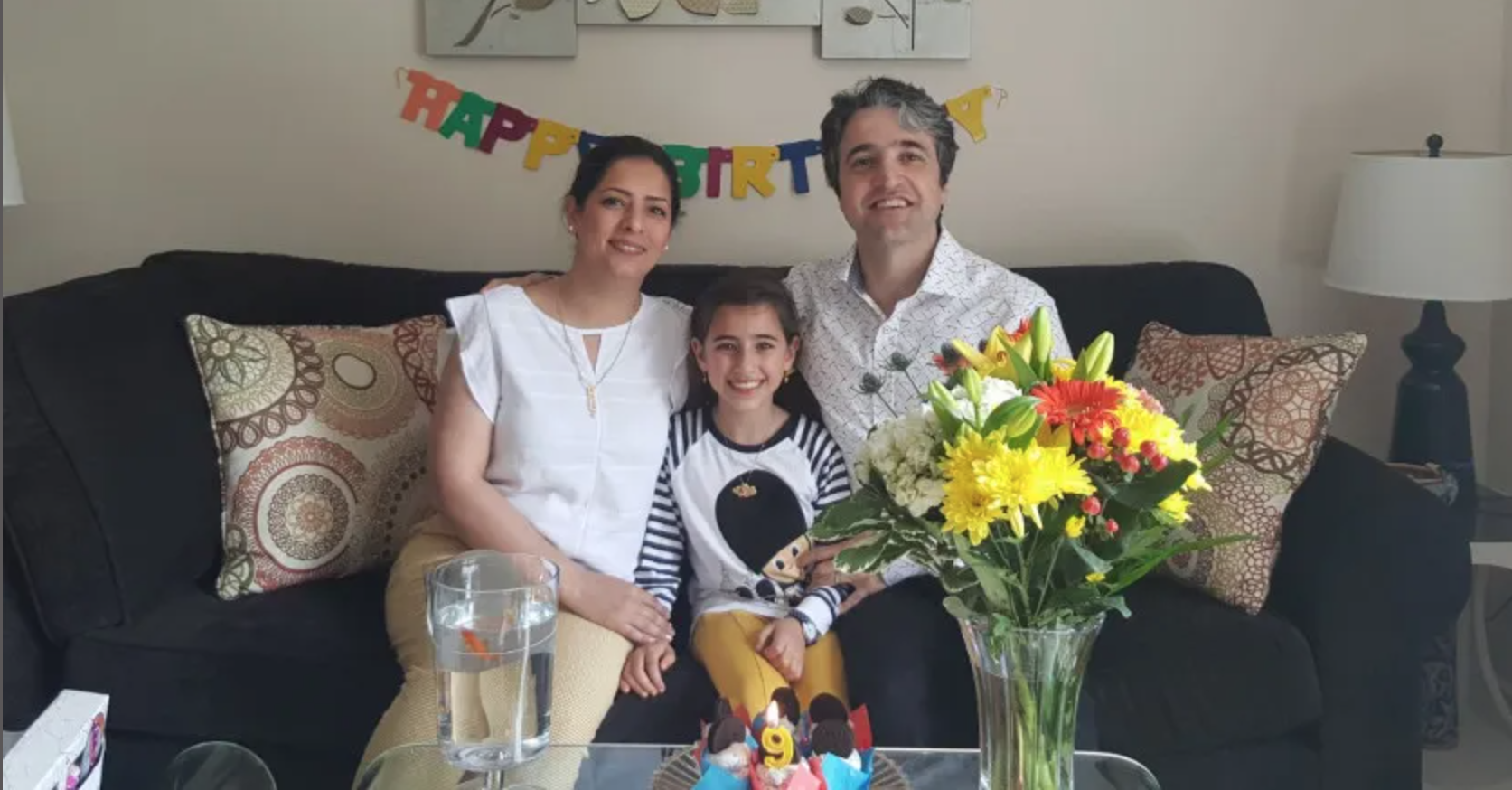 Hamed Esmaeilion with wife Parisa and daughter Reera on her ninth birthday.