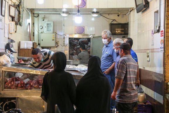 People shopping for food in Tehran. Undated