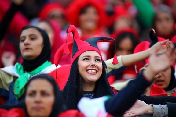 Female fan of Tractor FC at Tehran's Azadi Stadium