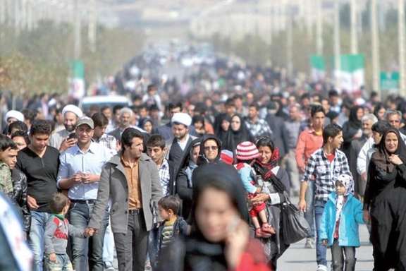 Photo showing Iranians walking in Tehran. Undated