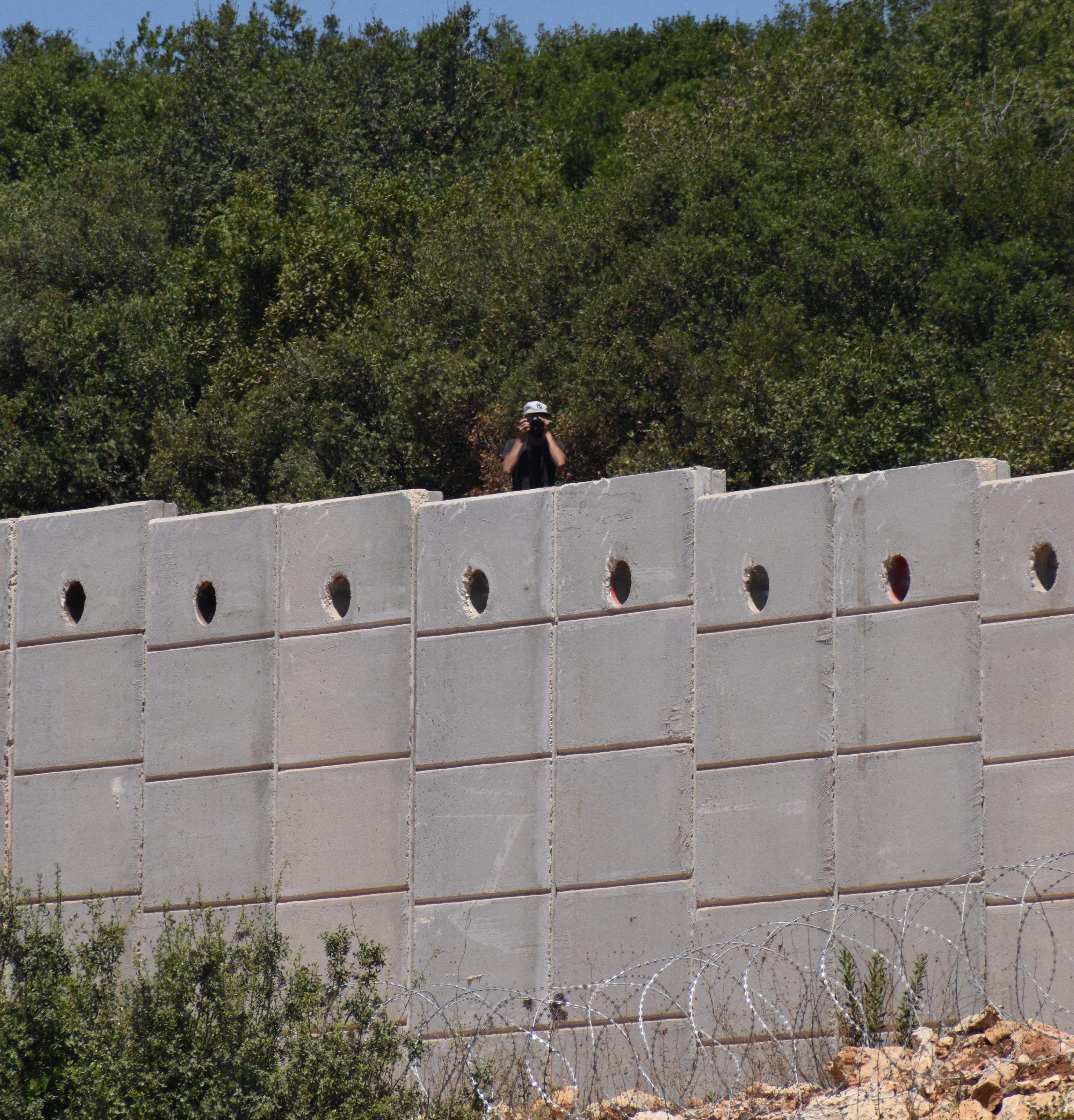 Hezbollah militant pictured in Lebanon near border with Israel 