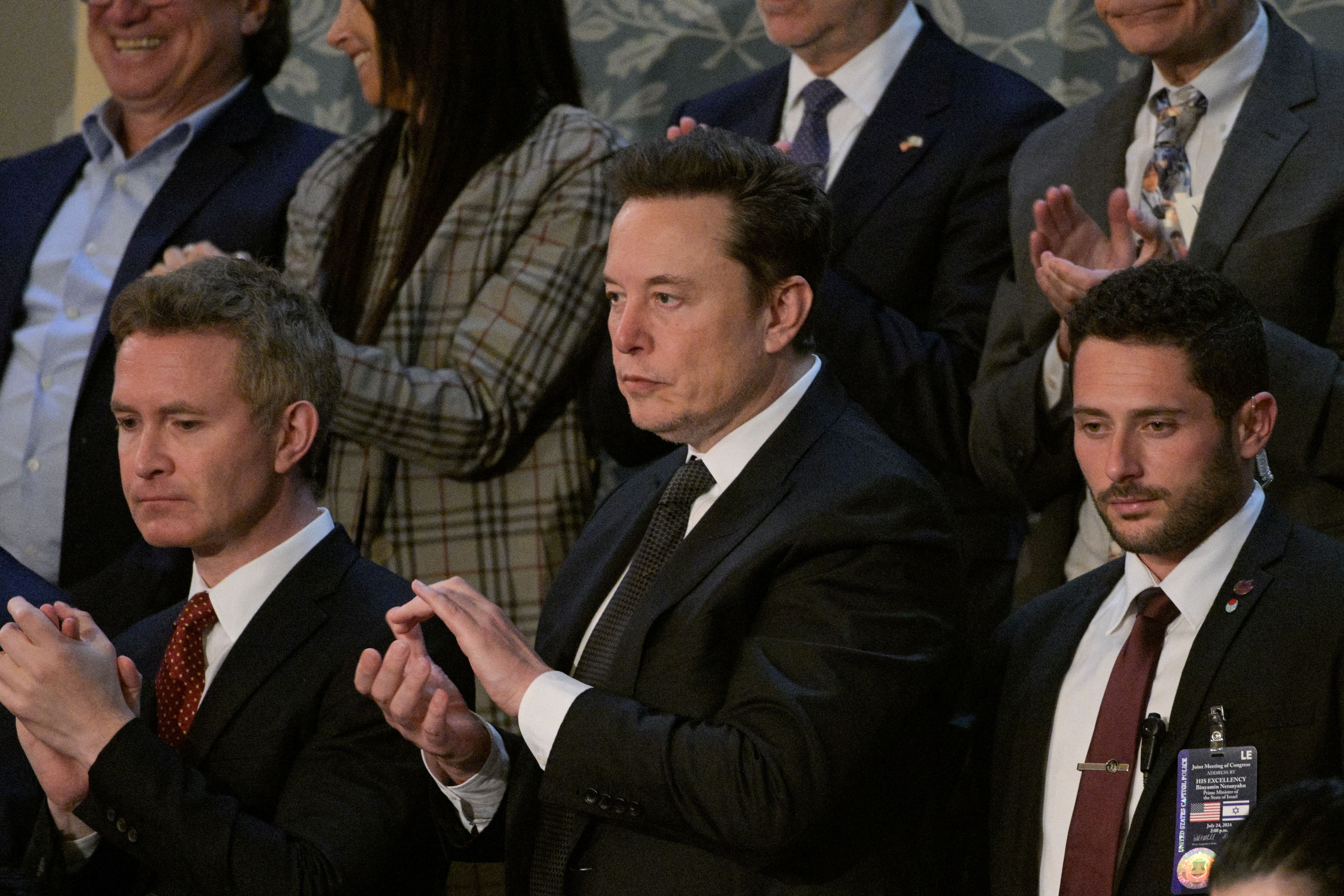 Elon Musk, Chief Executive Officer of SpaceX and Tesla, applauds as Israeli Prime Minister Benjamin Netanyahu addresses a joint meeting of Congress at the US Capitol in Washington, US, July 24, 2024. 
