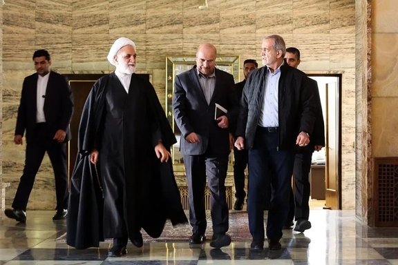 Iran's Judiciary Chief Mohseni Ejei (left), Parliament Speaker Mohammad Bagher Ghalibaf and President Masoud Pezeshkian (right)