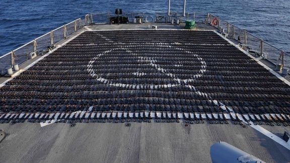 More than 2,000 assault rifles displayed on the deck of USS Sullivans on January 7, 2023