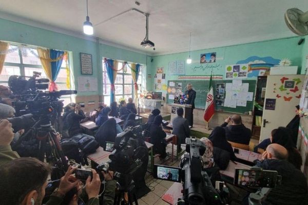Iran holds press conference at school as concerns grow over use of civilian sites