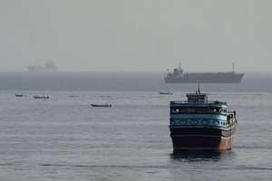 Journalist ties tanker attacks to oil middlemen, drawing treason accusations