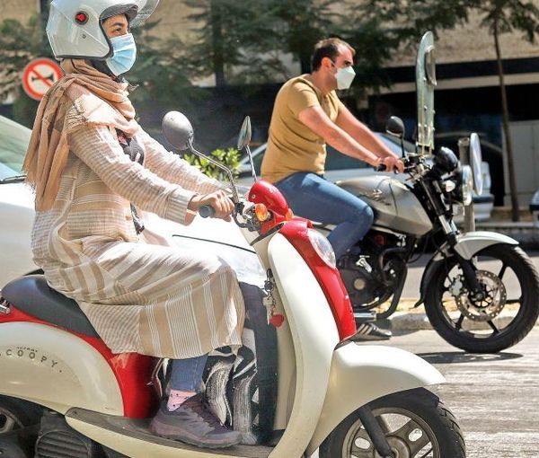 Iranian Police Detain Motorcyclists Offering Ride To Woman Without Hijab