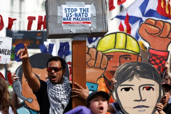 Protesters demonstrate outside a NATO meeting in the Hague, Netherlands.