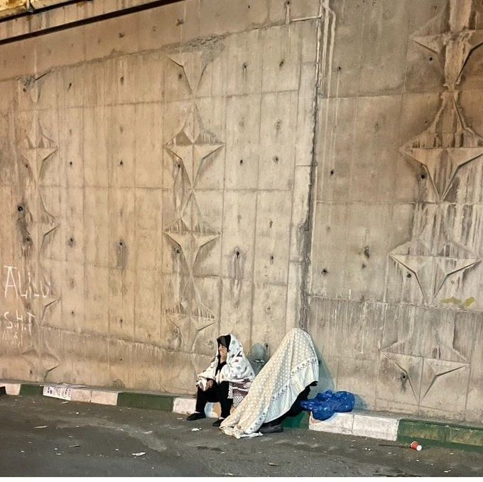 Hossein Ronaghi’s parents outside Evin prison  (November 2022)