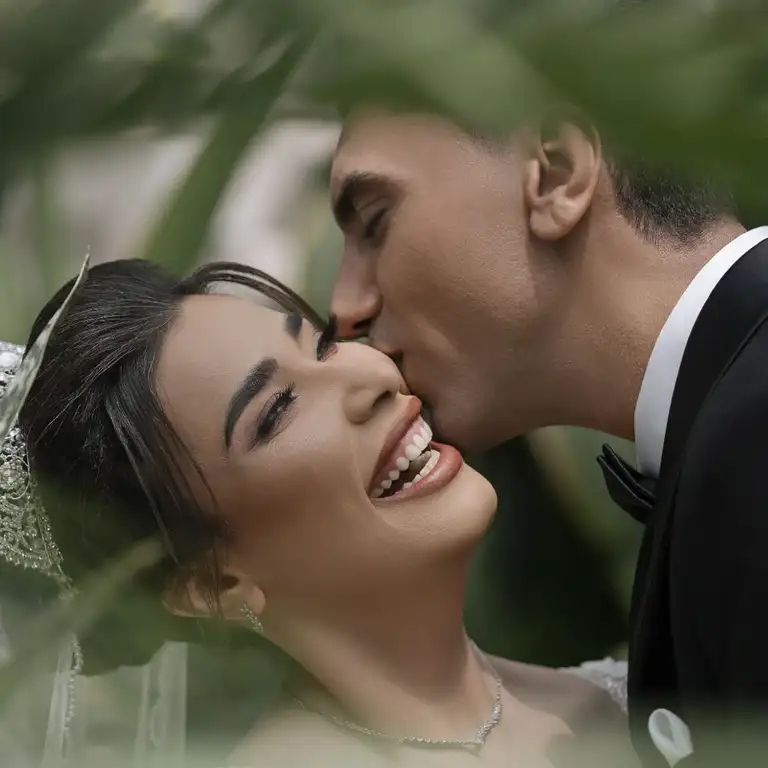 Shahrouz Mehrabi and his wife, Parvaneh, on their wedding day. Mehrabi was shot dead on January 8, his wife's birthday, after one year and four months of marriage.