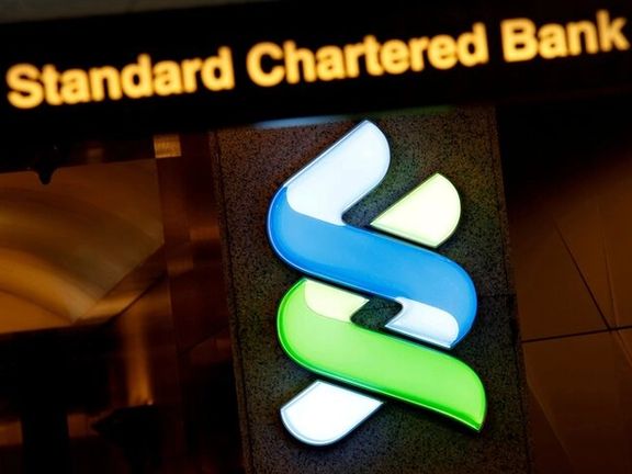 A logo of Standard Chartered is displayed at its main branch in Hong Kong, China, Aug. 1, 2017
